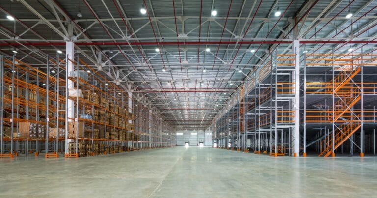 Warehouse with mezzanine floor maximising vertical storage space